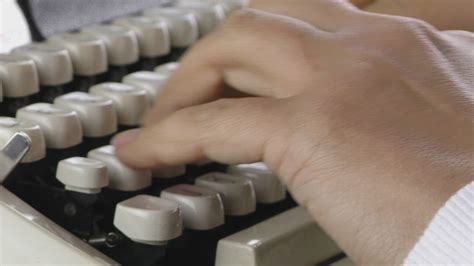 Person Typing On Old Typewriter Free Stock Video