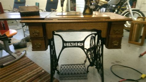 A Singer Treadle sewing machine 1904 Montreal serial # B451034. Machine cleaned and restored to ...