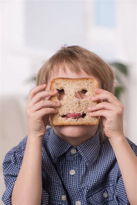 Portrait Of Funny Boy Playing With Bread Stock Image Image Of Bread
