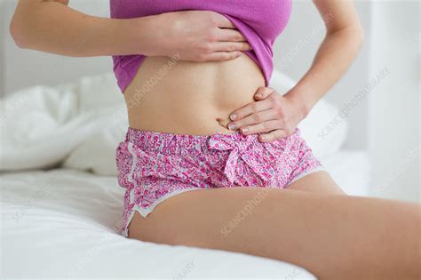Woman Suffering From Abdominal Pain Stock Image C034 6780 Science
