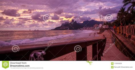 Sunset On The Beach In Ipanema Water Mountain And Sky Editorial