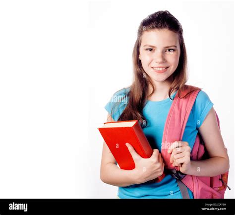 Young Cute Teenage Girl Posing Cheerful Against White Background With