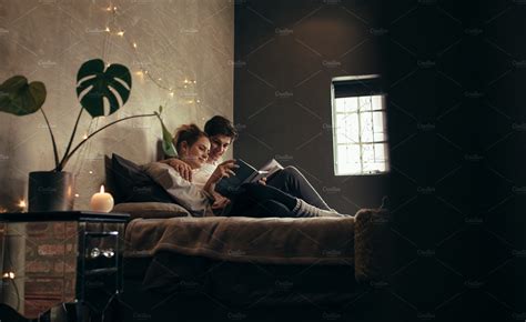 Couple Reading Book Together ~ People Photos ~ Creative Market