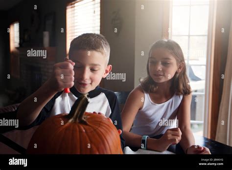 Children Carving Pumpkin Stock Photo Alamy