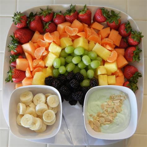 A fabulous and healthy fruit salad recipe featuring a rainbow of your favorite tropical fruits, all tossed with a sweet and creamy yogurt dressing. theworldaccordingtoeggface: Healthy Party Recipe: The ...