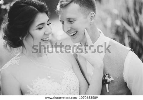 Beautiful Wedding Couple Bridegroom Kissing Posing Stock Photo