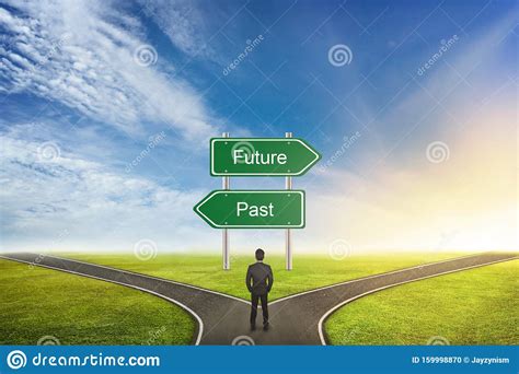 Businessman Concept Of Choose The Correct Way Between Past Or Future