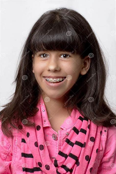 Young Latin Girl Smiling With Colored Braces Stock Photo Image Of