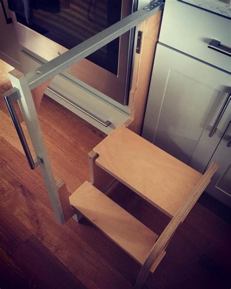 This Incredible Hideaway Step Stool Pulls Out From The Cabinet