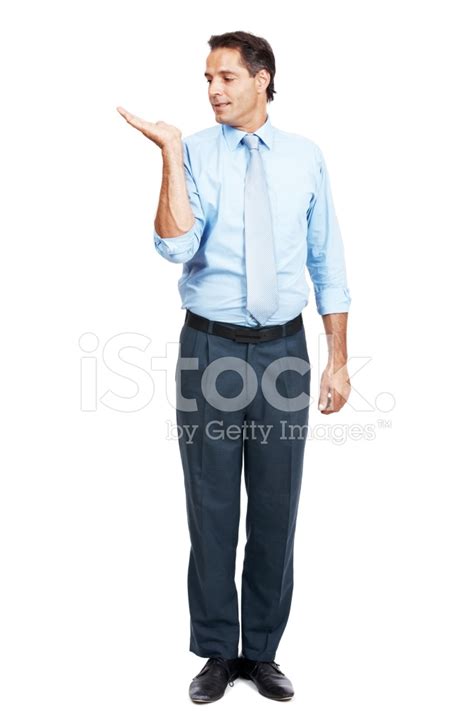 Business Man Holding Your Product Over White Stock Photo Royalty Free