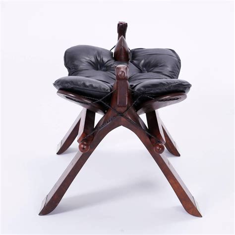 Maker of high quality furniture since 1870. Anglo-Indian Rosewood Camel Foot Stool at 1stdibs