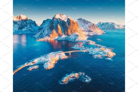 Aerial View Of Reine And Hamnoy At Sunrise In Winter Featuring Aerial