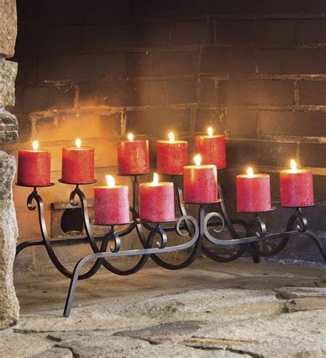 Flameless votive candles in fireplace candelabras. Creating Beautiful Fireplace Candelabras | Fireplace ...