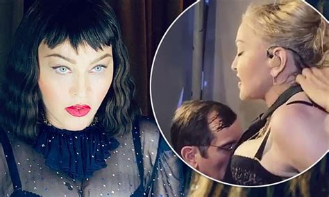 Madonna Dons A Very Busty Corset And Rests A Mans Head Between Her Breasts In Backstage Snaps