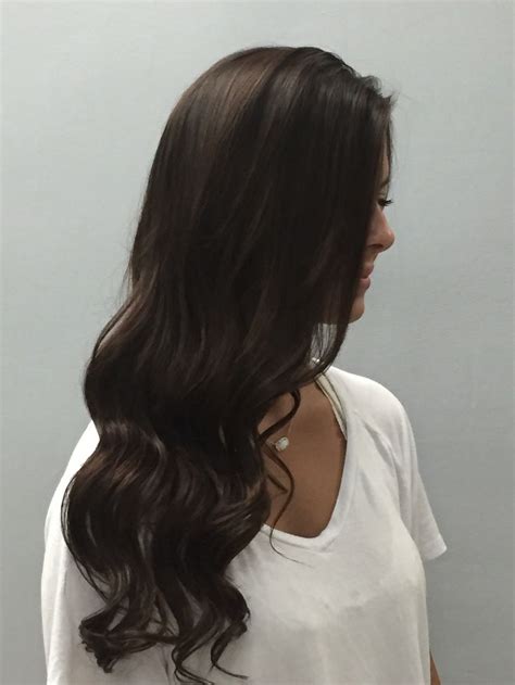 Skip the conditioner when washing your hair, as this can sometimes make the hair too soft and slippery, leading to curls falling out faster. Dark brown long curled hair. | Curls for long hair, Long ...