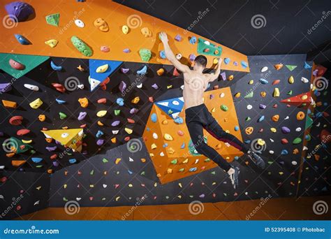Man Practicing Bouldering In Indoor Climbing Gym Stock Photo Image Of