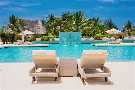 Gold Zanzibar Beach House And Spa Resort Nungwi Zanzibar Tanzania Pool Deck Chairs Travoh