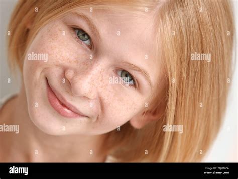 Closeup Portrait Of Attractive Teenager Girl With Freckles Stock Photo