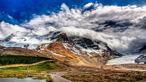 Awesome Mountains In Clouds Hd Wallpaper