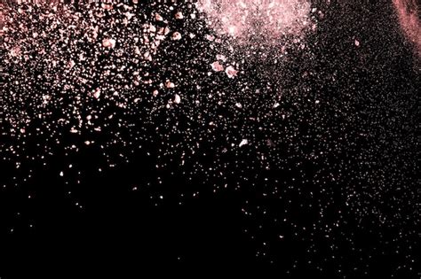 Premium Photo Light Pink Color Powder Explosion On Black Background