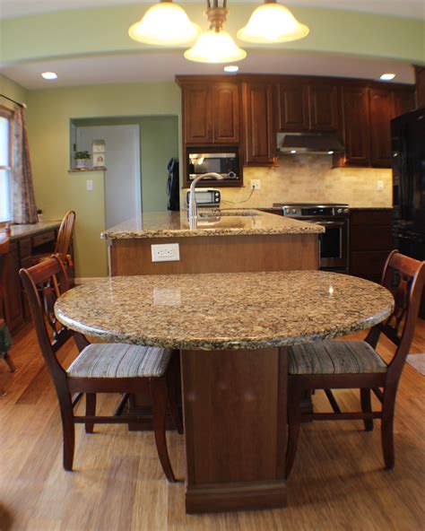 Maybe you would like to learn more about one of these? Village Home Stores | Kitchen island dining table, Cherry cabinets kitchen, Kitchen island table