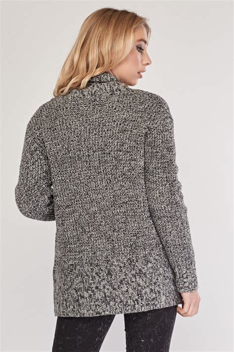 This oversized cable knit cardigan features an open front, relaxed sleeves, and a slouchy fit. Chunky Knit Speckled Cardigan - Just $6