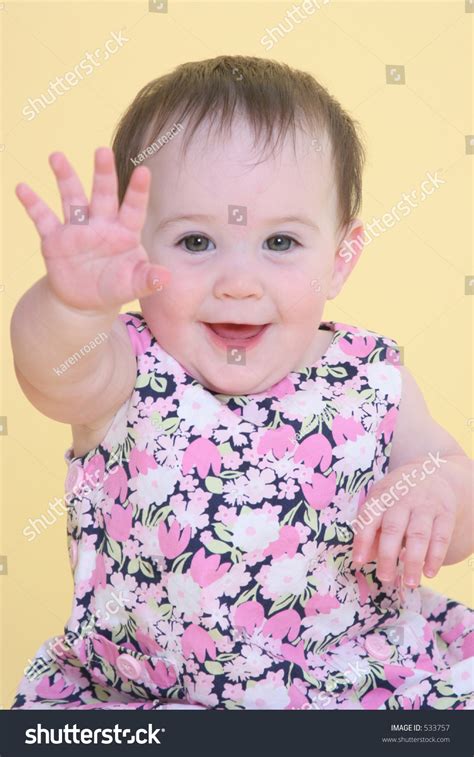 Girl Smiling Waving Hello Stock Photo 533757 Shutterstock