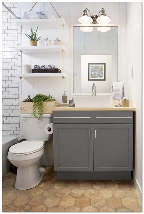 Atlanta designer julie montgomery used contemporary sconces and a curved vanity with marble top. 99+ Small Master Bathroom Makeover Ideas on a Budget 74 ...