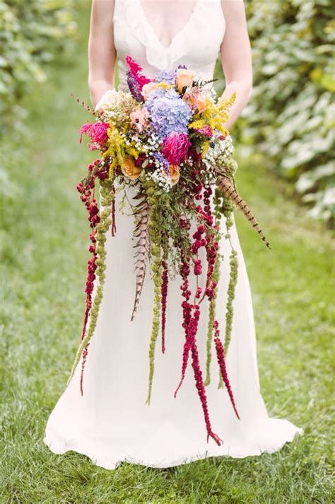 Bohemian Cascading Bouquet Love Lies Bleeding Pheasant Feathers Ivy And Aster Anemone