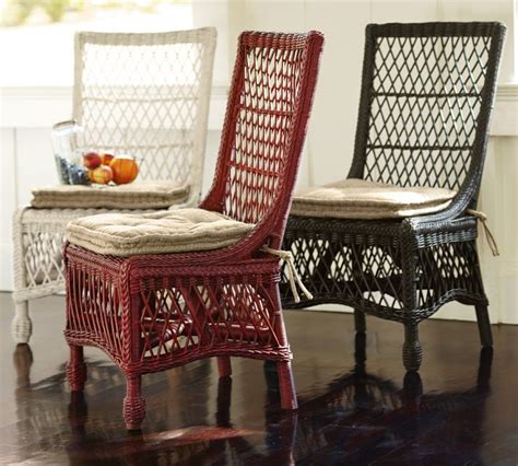 Wicker dining room chairs in a coastal home featured at my home ideas. vignette design: Musical (Rattan) Chairs