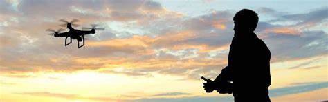 Man Operating Drone During Sunset Coverdrone Ireland