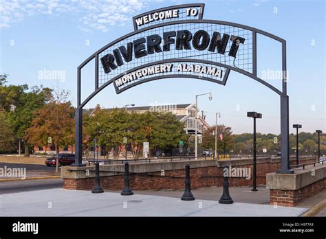 An Arched Welcome Sign Marks The Entrance To Riverfront Park In