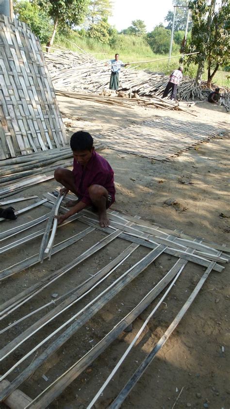 Craftsmen Weaving Walls Making Bamboowalls For Bamboohouses In Laos