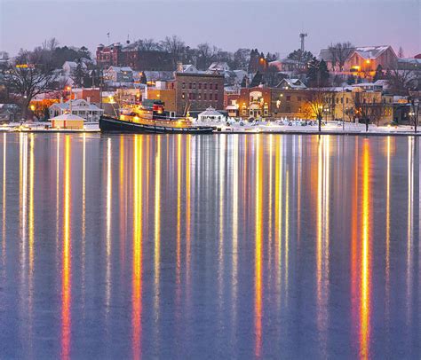 Beautiful Kewaunee Wisconsin reflected in harbor ice. Photograph by James Brey
