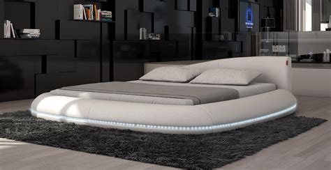 This bed frame has the rear and foot massager and night lights. Cerchio Modern Eco-Leather Bed w/ LED Lights