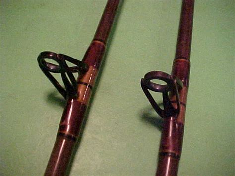Pair Of Daiwa Sealine Graphite Custom Conventional Fishing Rods