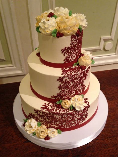 3 Tier Buttercream Wedding Cake With Red Scrolling