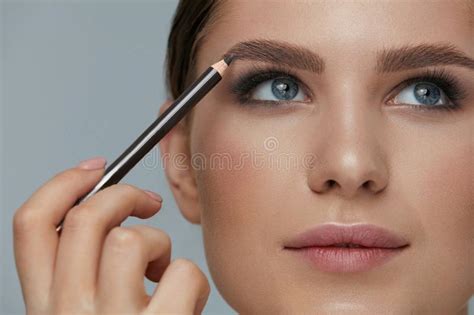 Beauty Makeup Woman Shaping Eyebrow With Brow Pencil Closeup Stock Image Image Of Model