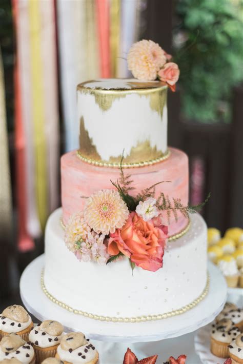 Coral And Gold Flecked Wedding Cake With Fresh Flowers