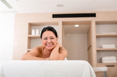 Sensual Mature Woman Relaxing On Stairs Of Historic