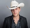 Justin Moore Shares Gruesome Photo of His Leg After a Horse Stepped on ...