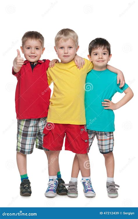 Three Fashion Little Boys Stand Together Royalty Free Stock Photography