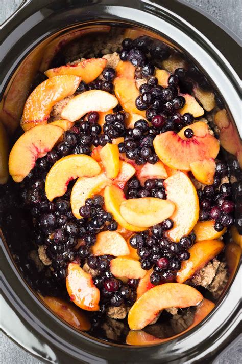 And for more, don't miss these 15 classic american desserts that deserve a comeback. Slow Cooker Blueberry Peach Cobbler - Kristine's Kitchen