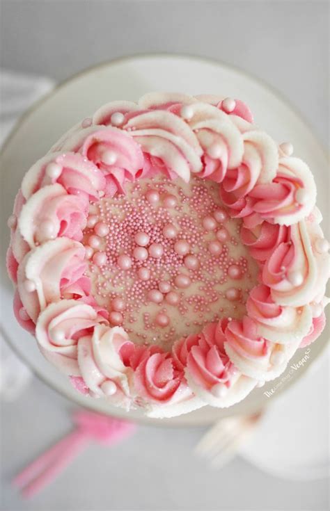 Using a cake leveler, slice the cake in half. Funfetti Flamingo Cake Recipe | The Little Blog Of Vegan