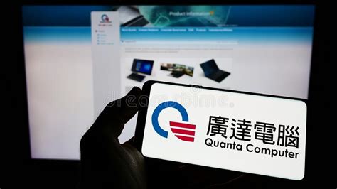 Person Holding Mobile Phone With Logo Of Taiwanese Electronics Company