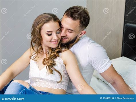 Young Couple At Home Telegraph