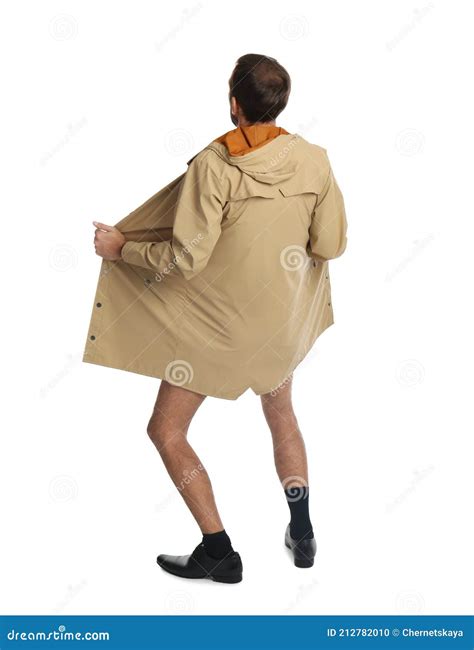 Exhibitionist Exposing Naked Body Under Coat On Black Background Royalty Free Stock Image