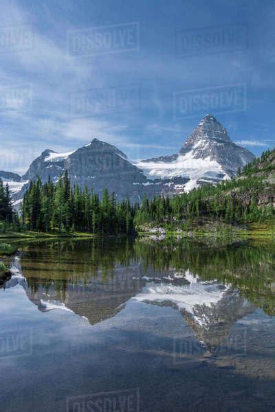 Mount Assiniboine Reflected In Sunburst Lake Stock Photo Dissolve