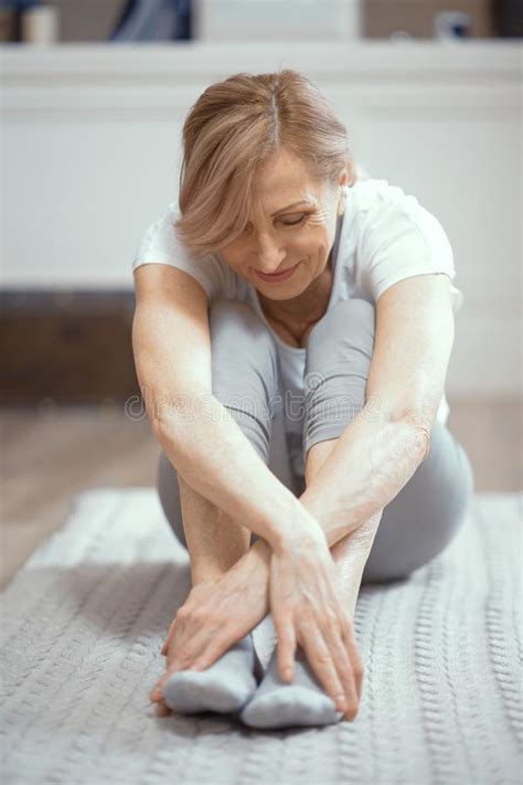 Cheerful Mature Woman Relaxing After Yoga Exercises Stock Image Image Of Relaxing Active