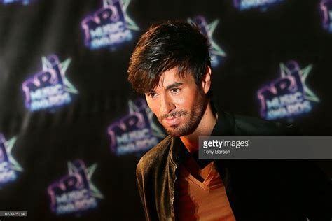 Enrique Iglesias Arrives At The 18th NRJ Music Awards At The Palais Des